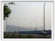 Le stade olympique de Pékin et le smog de la ville